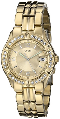 Montre-bracelet GUESS dorée avec fonction de date. Montre-bracelet GUESS dorée avec fonction de date.
